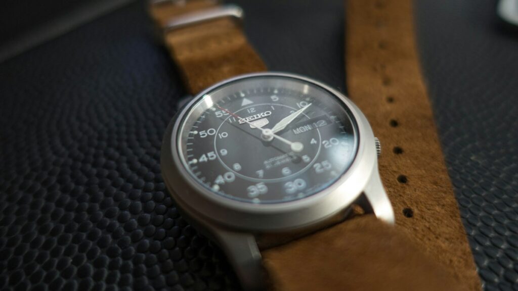 Close-up of a men's wristwatch and dial