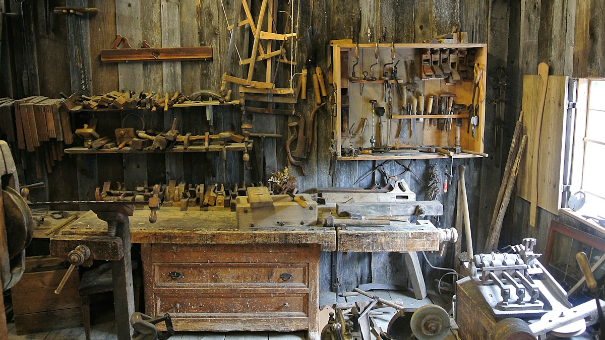 Woodworking workshop with tools for a boat building project