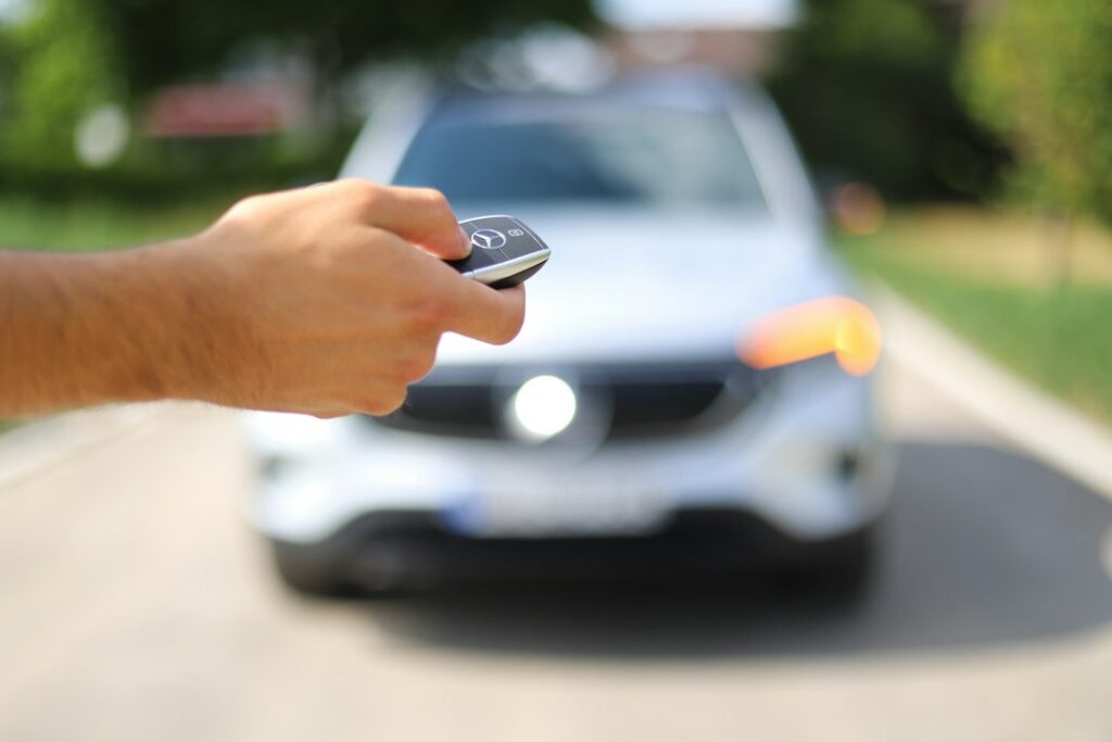 Private seller handing car keys to a buyer