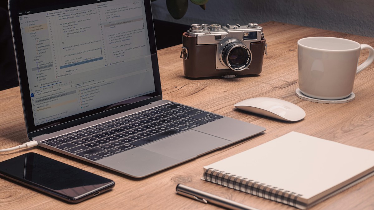 Laptop and creative tools arranged for digital content production