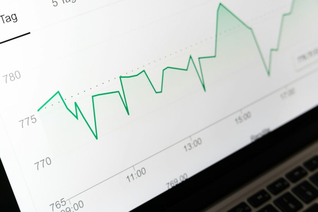 Credit score report and financial information on a laptop