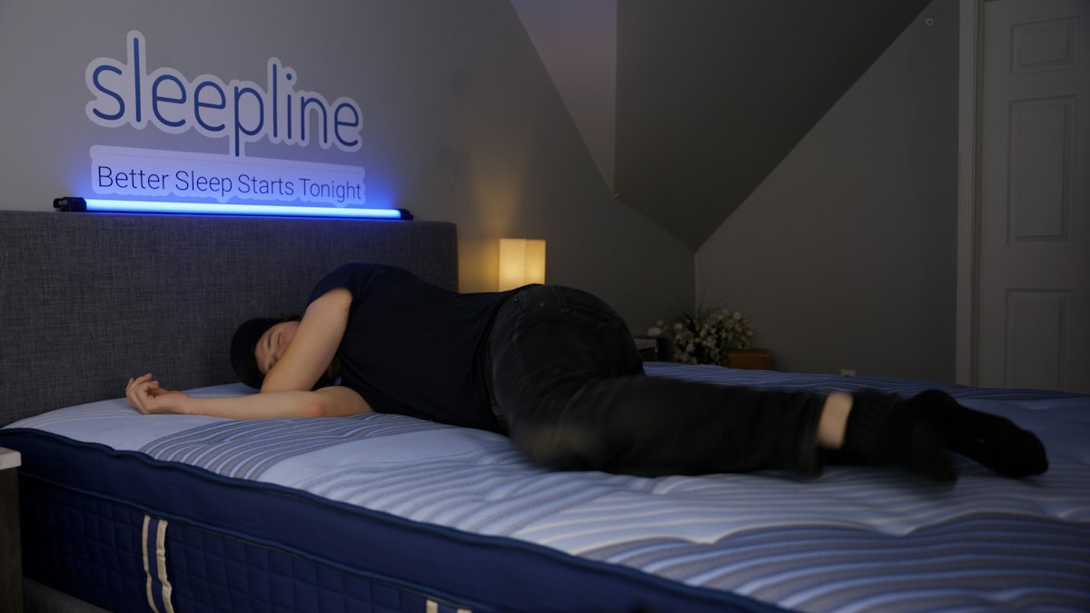 Man sleeping on a pillow in a bedroom