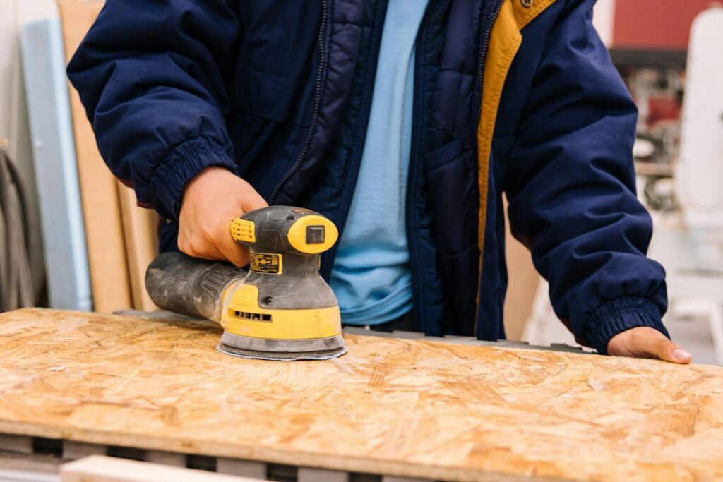 Essential woodworking tools arranged on a workbench