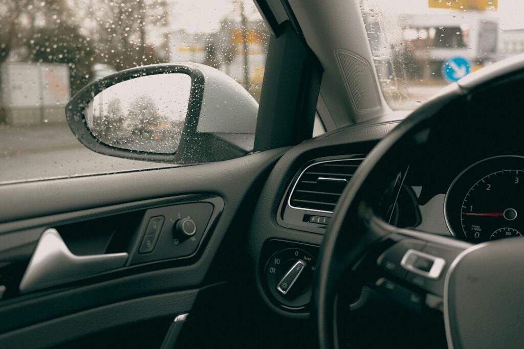 Interior of a vehicle being checked for water damage