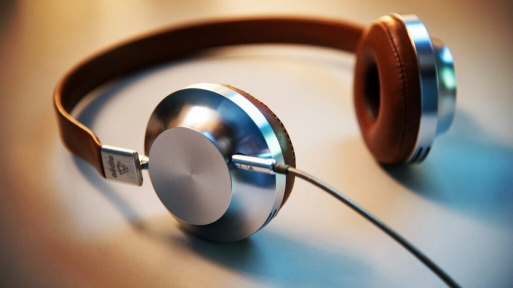 Headphones for an editorial review of an audio-based financial program