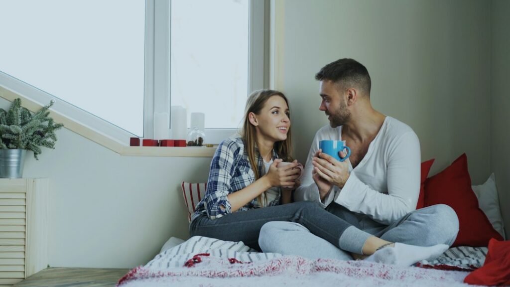Couple having a thoughtful conversation at home