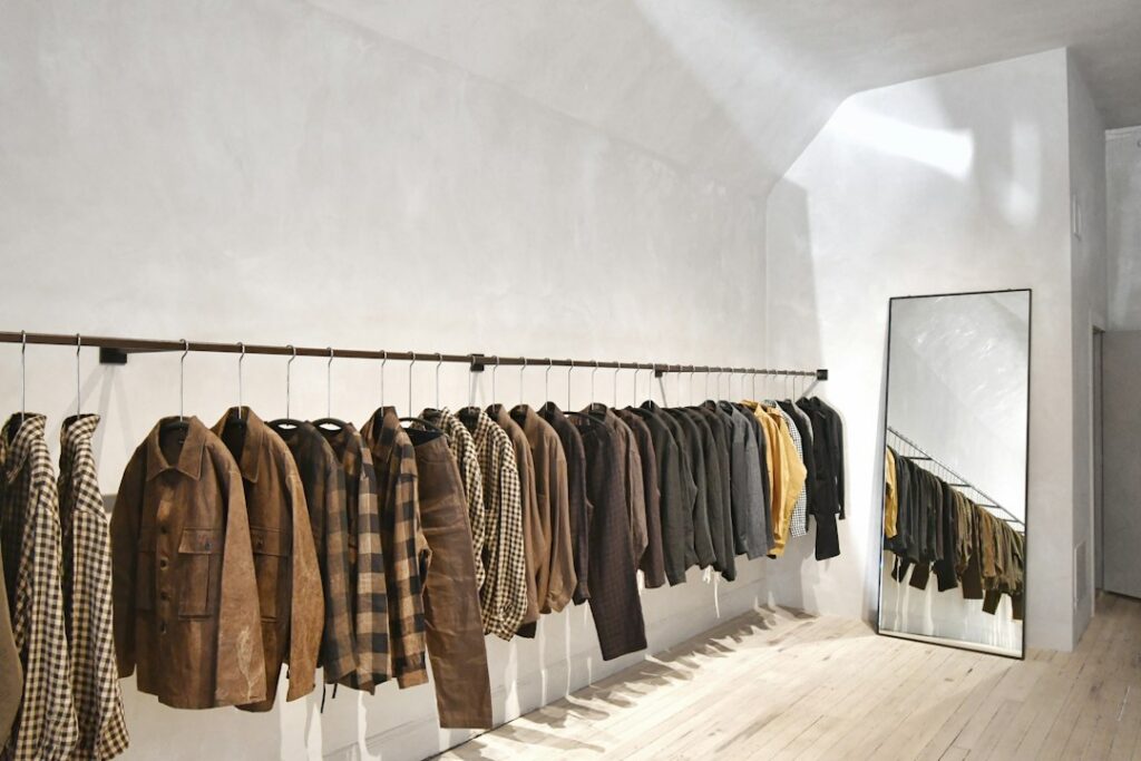 Men's clothing arranged in a cohesive neutral color palette