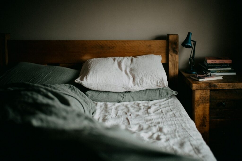 Different pillows arranged on a bed for comparison