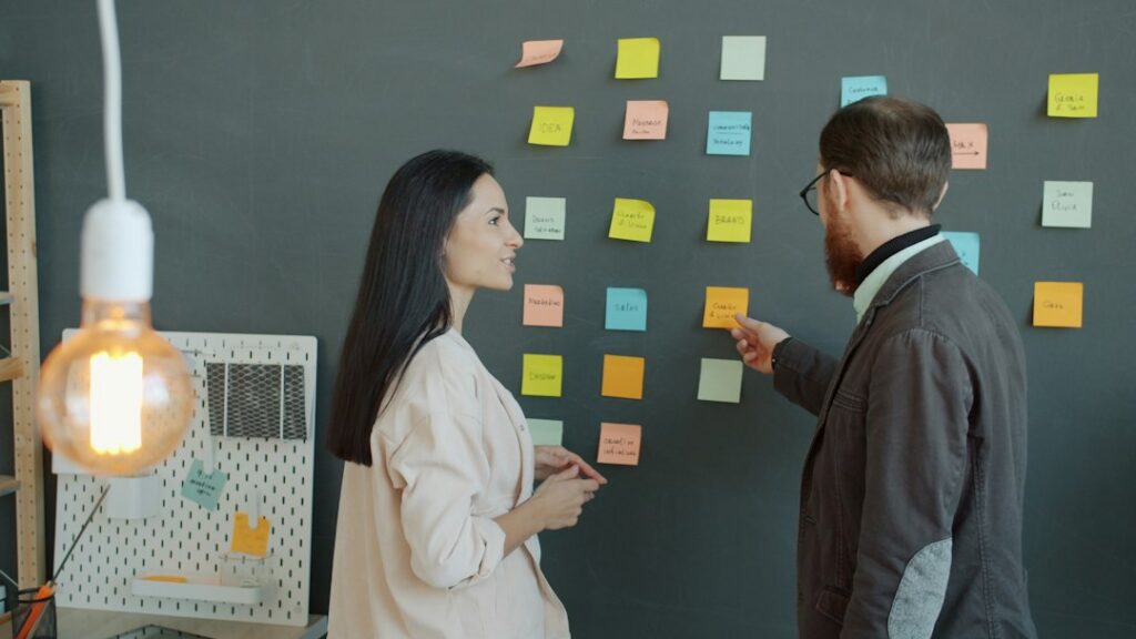 Professional presenting ideas to a manager during a career discussion