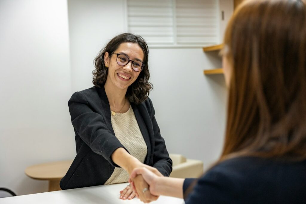 Candidate negotiating a job offer in a professional meeting