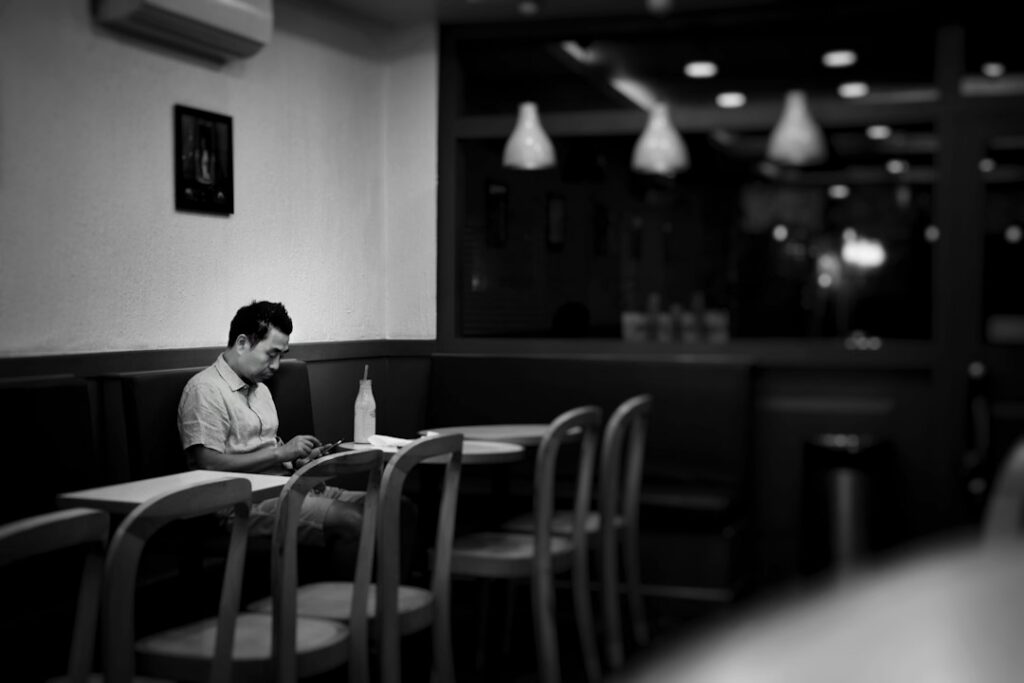 Man reflecting alone while avoiding comparison with others