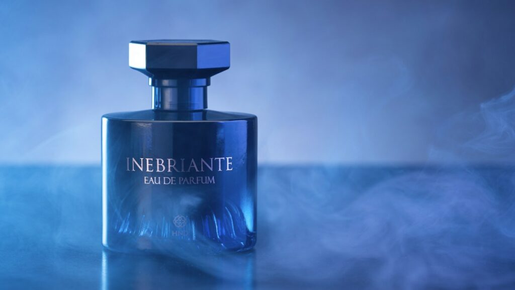 Blue fragrance bottle on a tabletop