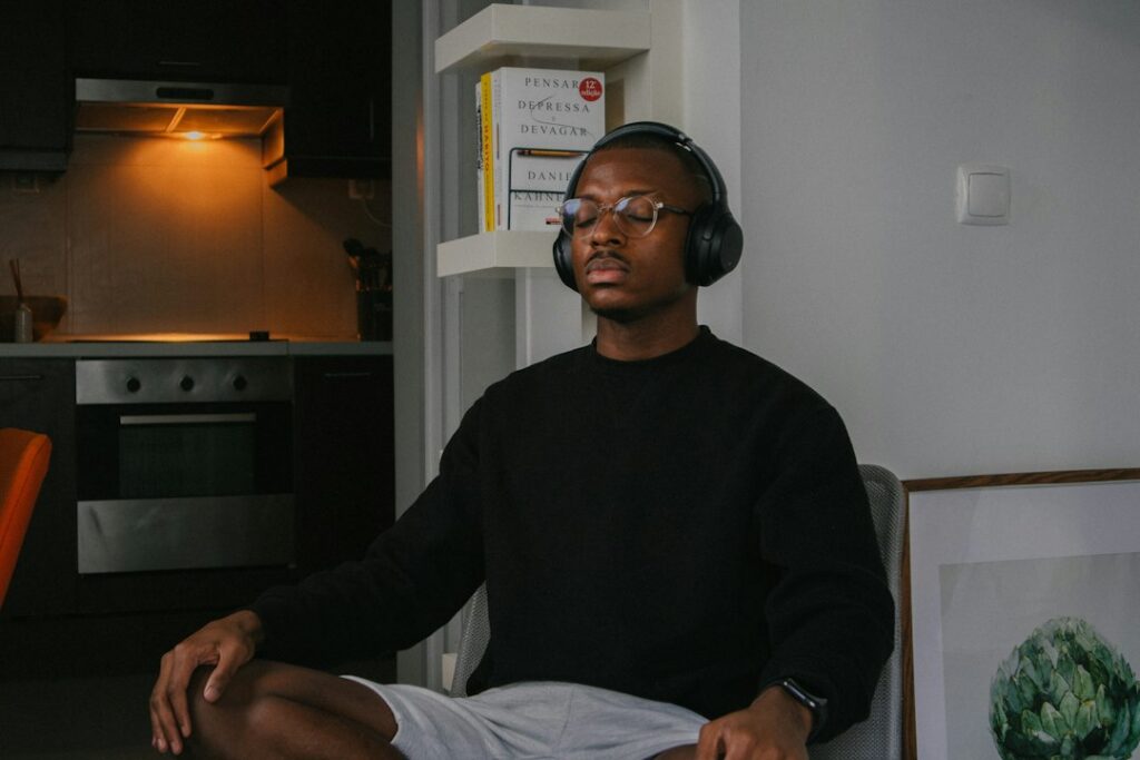 Man listening to a short brain training audio with headphones