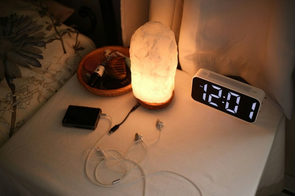 Sleep support supplement on a bedside table at night