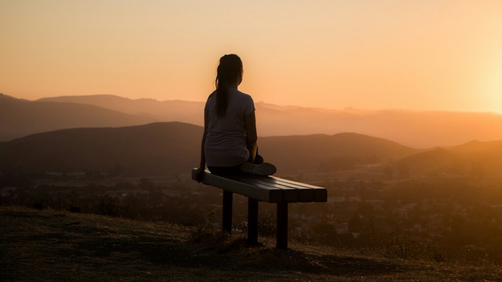 Meditation and journaling scene representing spiritual self reflection