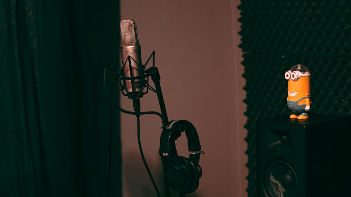 Microphone and laptop in a home recording studio