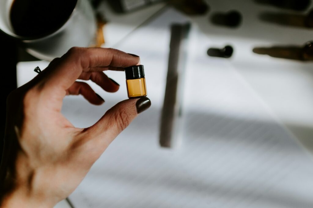 Heart health supplement bottle and capsules on a clean surface