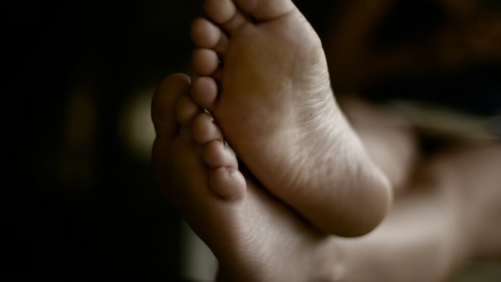 Close view of feet for an editorial review of detox footpad claims