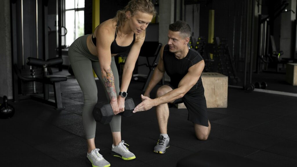 Man and woman performing an exercise together