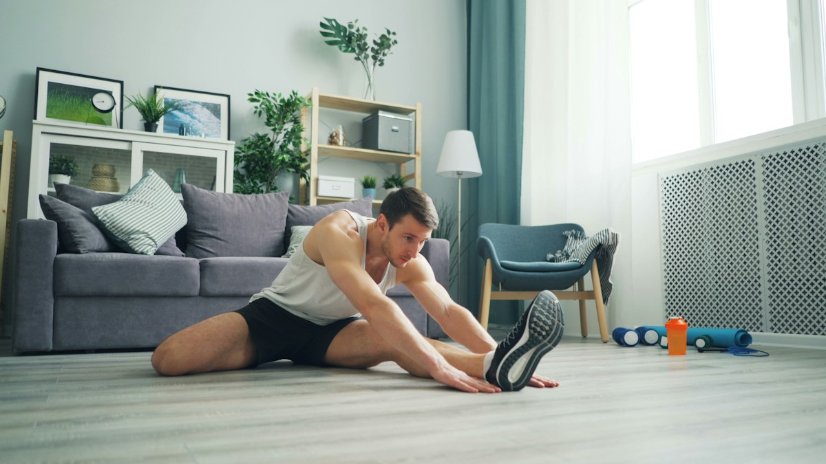 Man preparing for a home mobility and stretching session