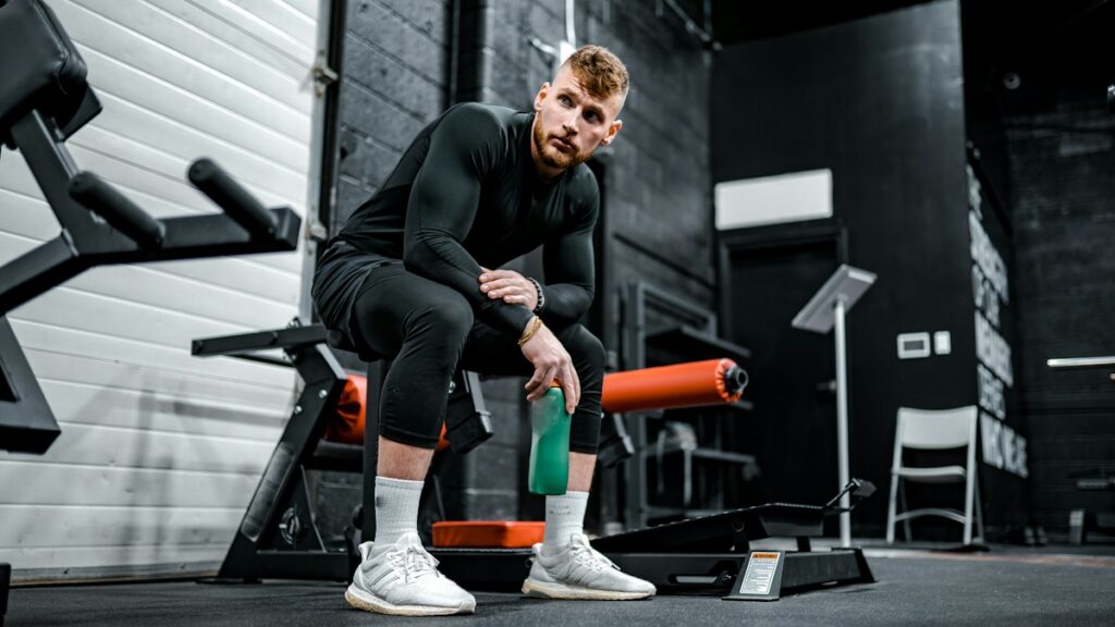 Man strength training in a gym