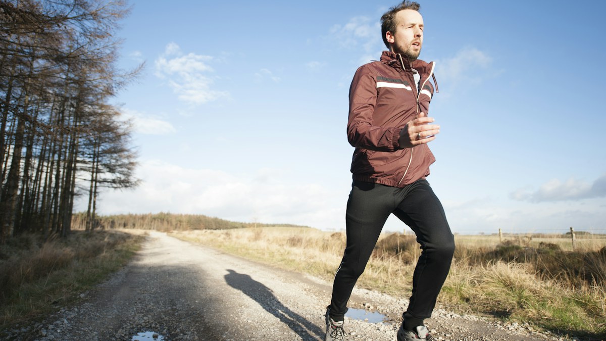 Man exercising outdoors for cardiovascular fitness