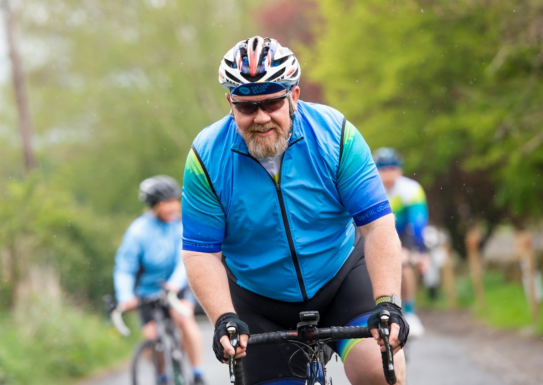 Mature man cycling outdoors
