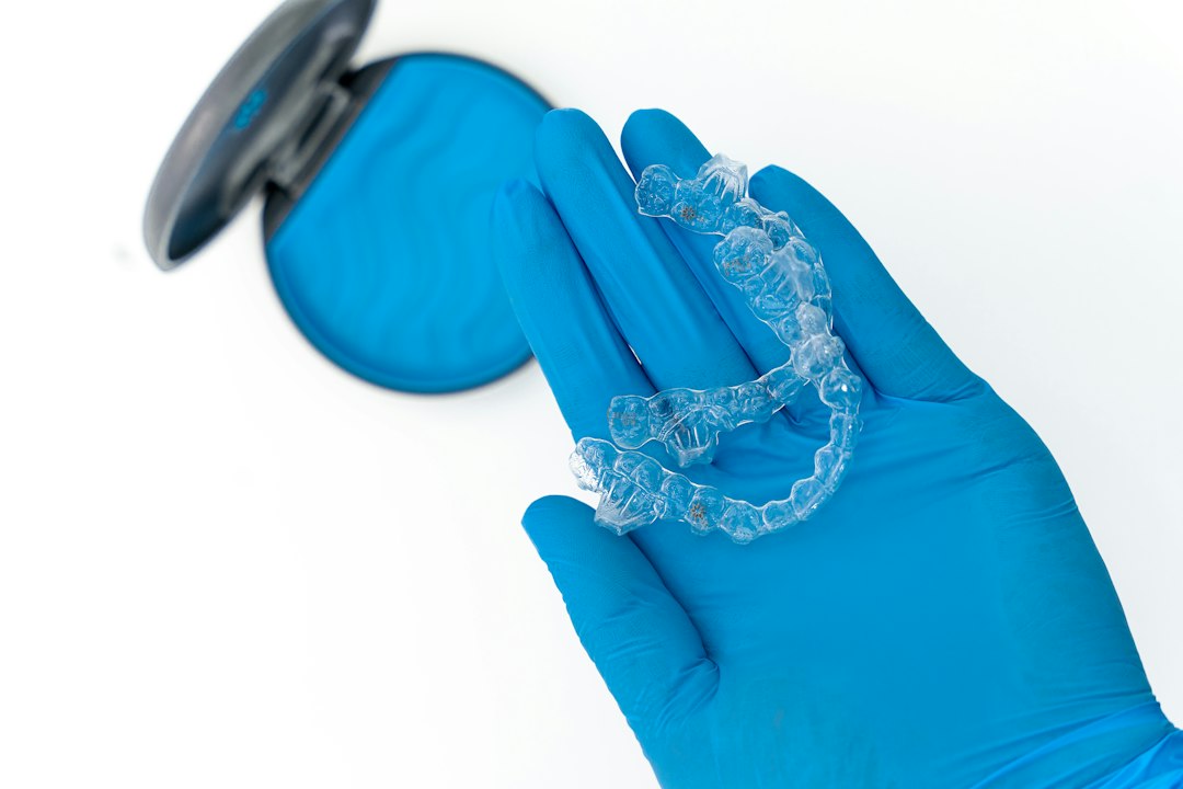 Dental professional holding oral care tools