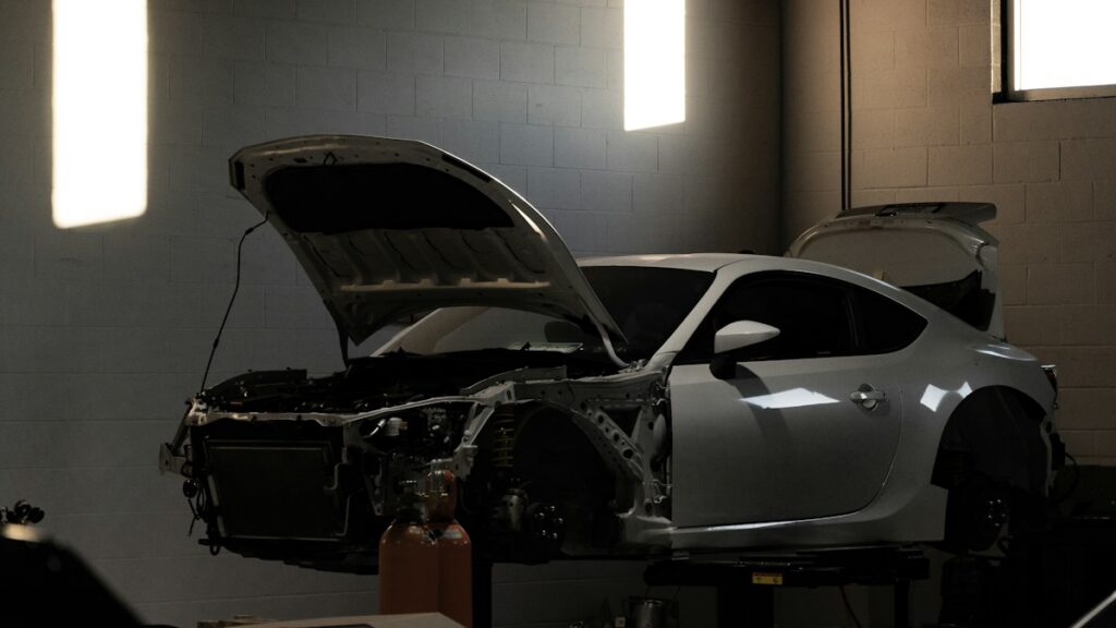 Mechanic working on a car in a workshop