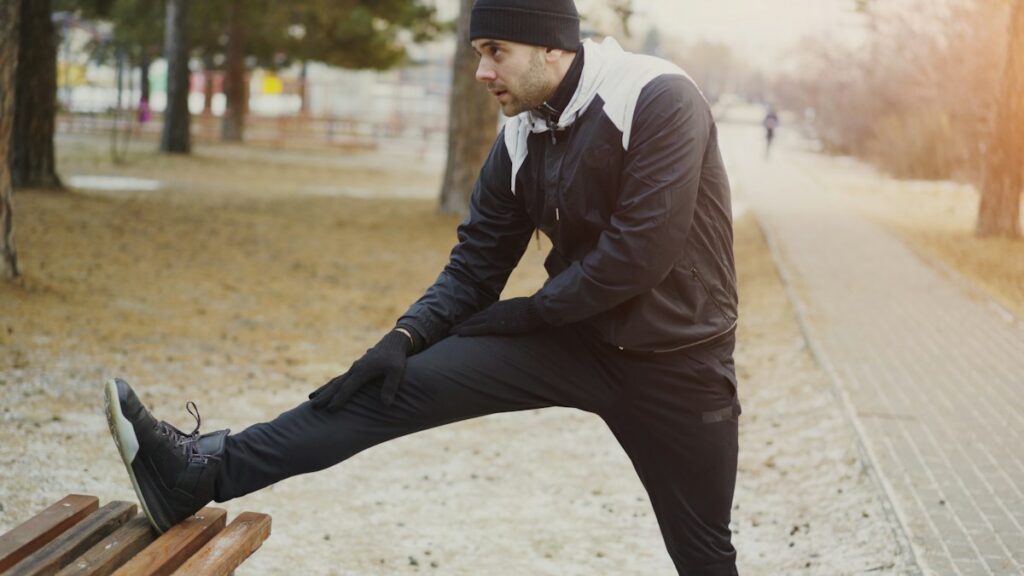 Man stretching outdoors before exercise