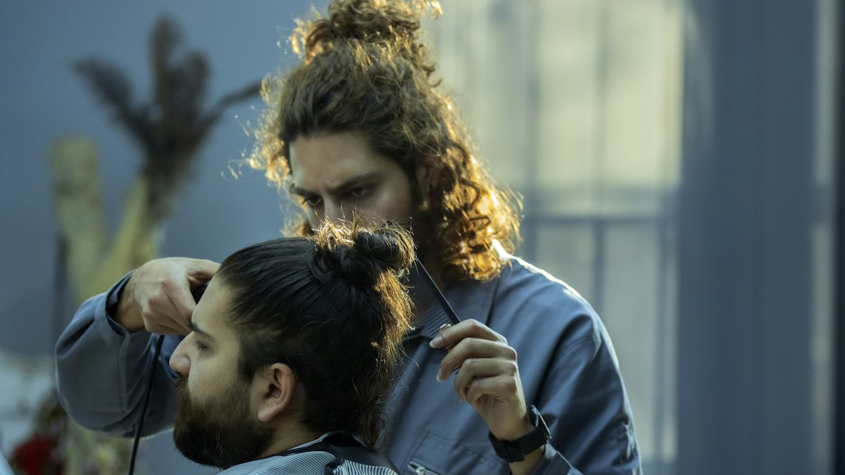Man with styled hair in a barbershop