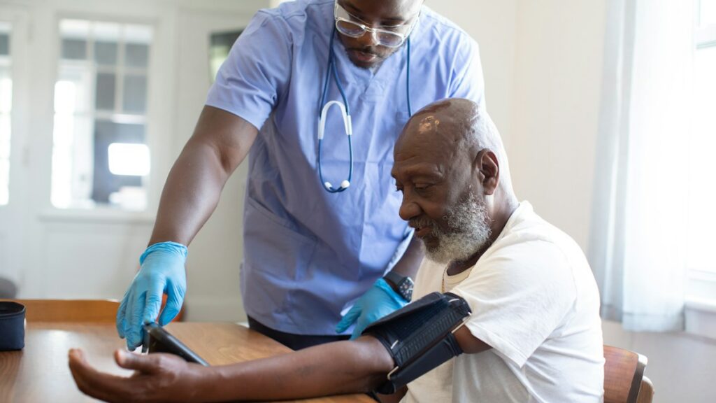 Man reviewing health information with a clinician