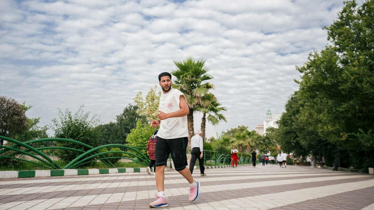 Man running outdoors in a park