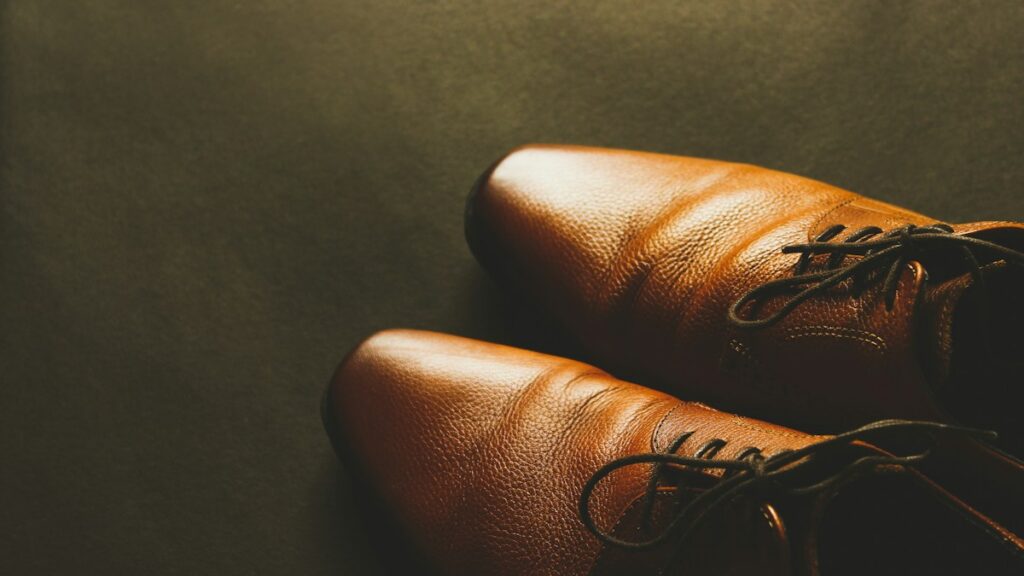 Pair of brown leather dress shoes