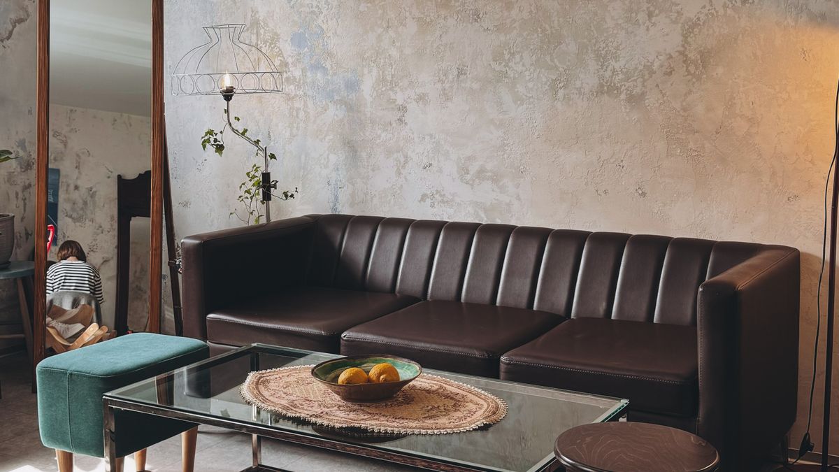 A living room with nested low tables and compact seating