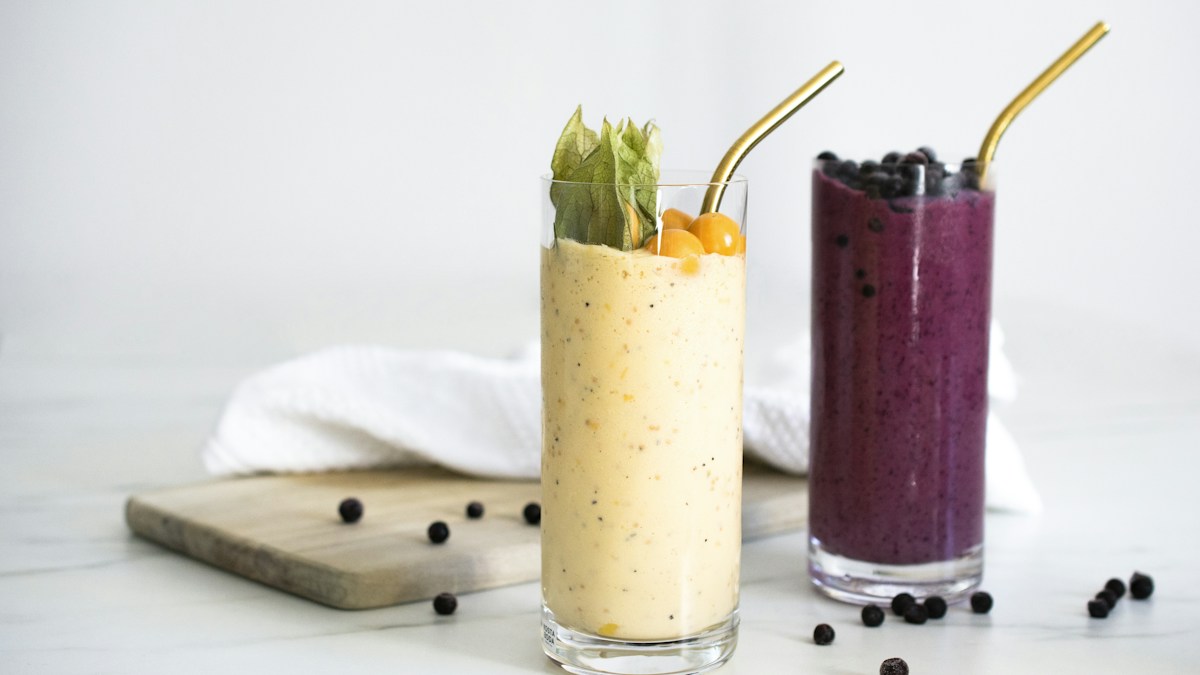 Berry smoothie served in a drinking glass
