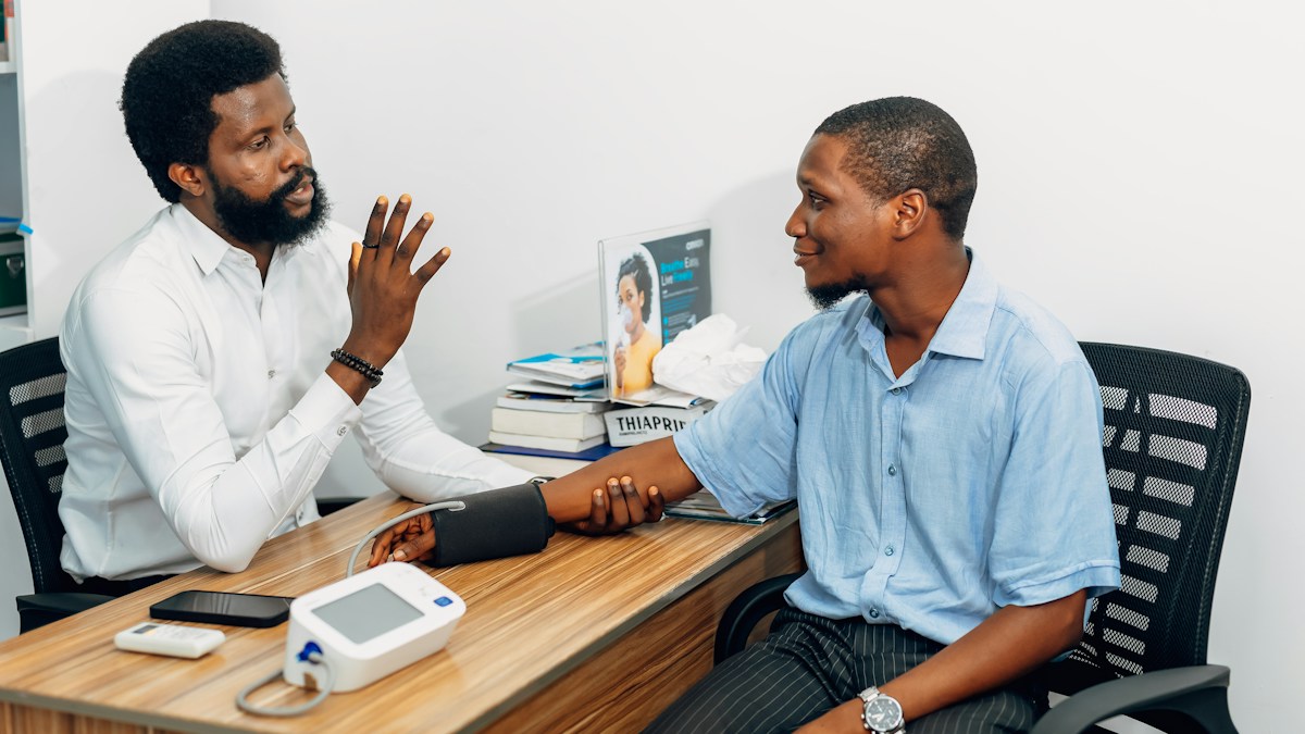 Patient discussing health with doctor