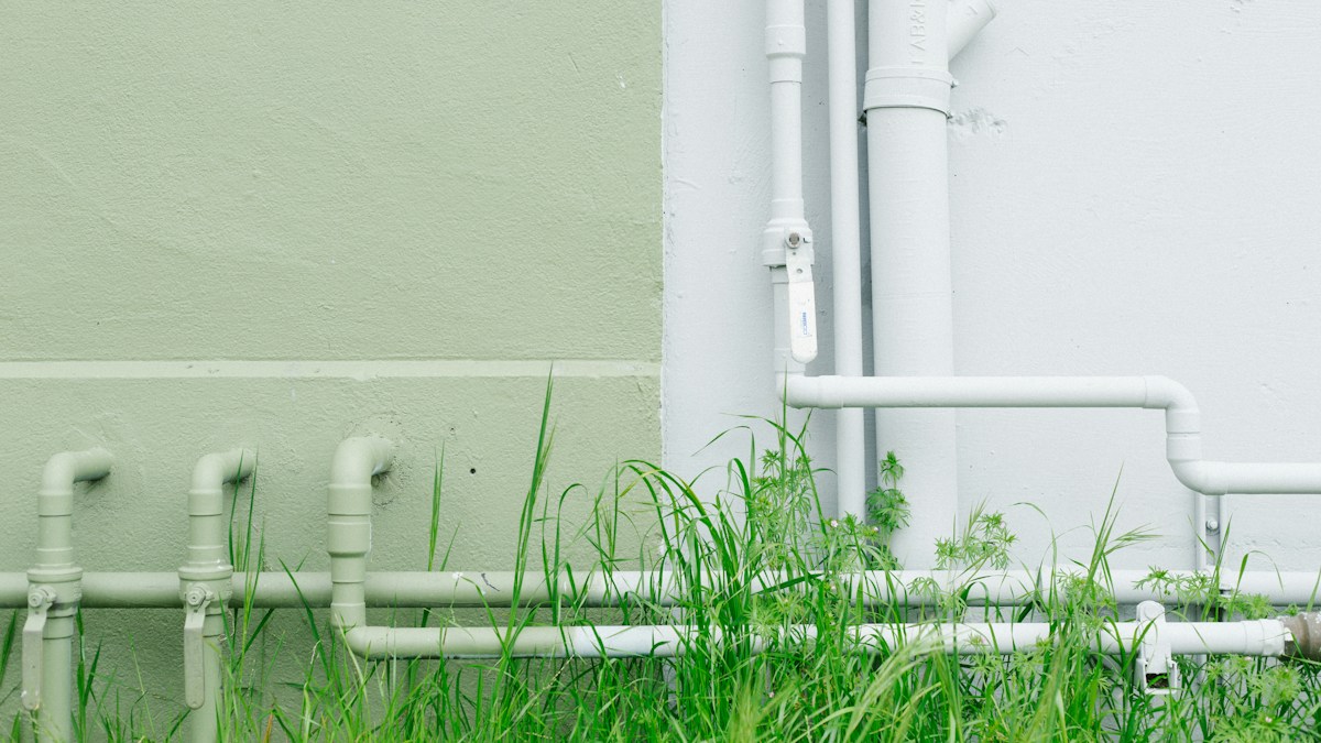Utility pipe near grass