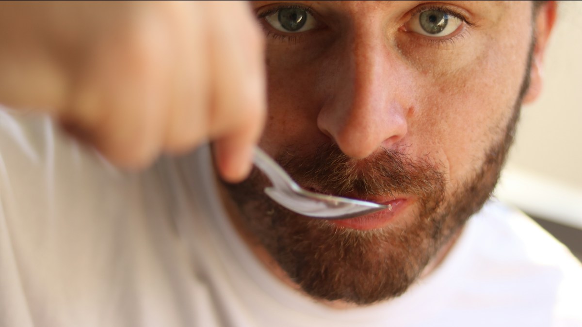 Man brushing his teeth