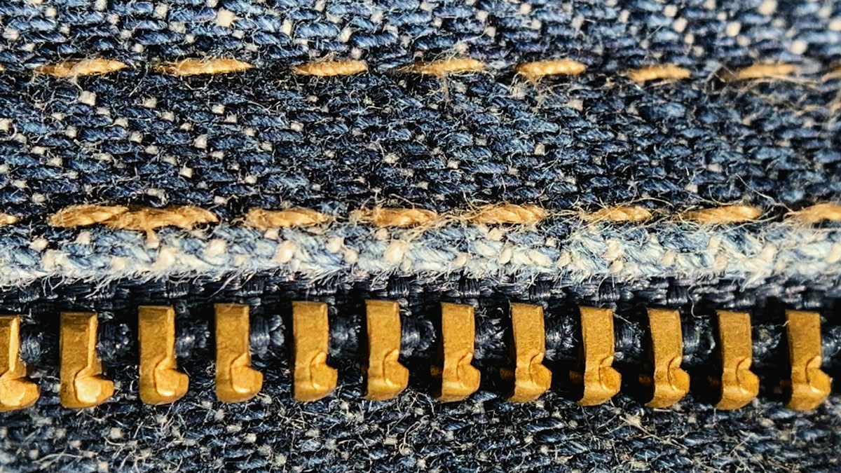 how to fix a pants zipper that keeps sliding down