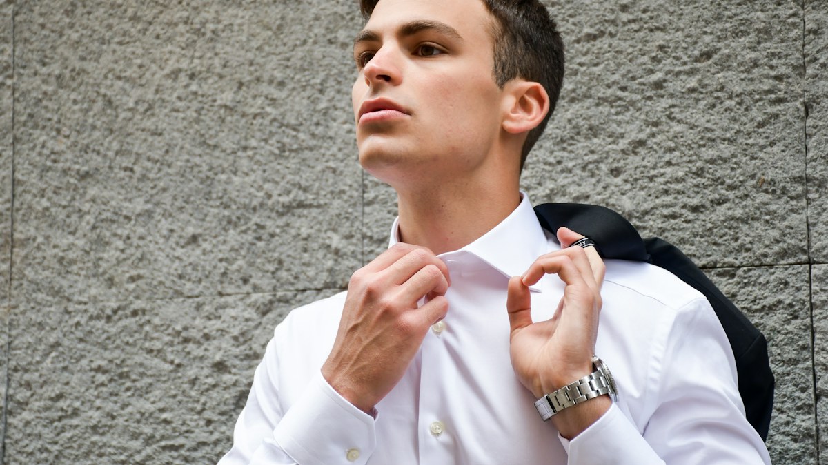 Man wearing a white dress shirt and tie