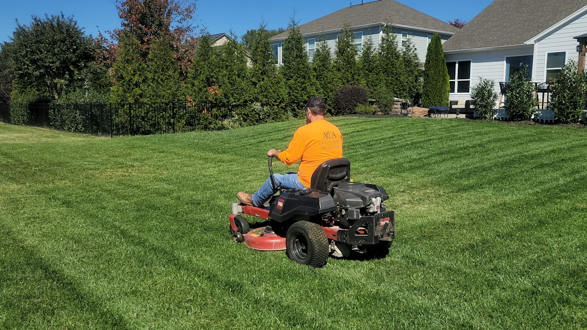 Man riding a lawnmower