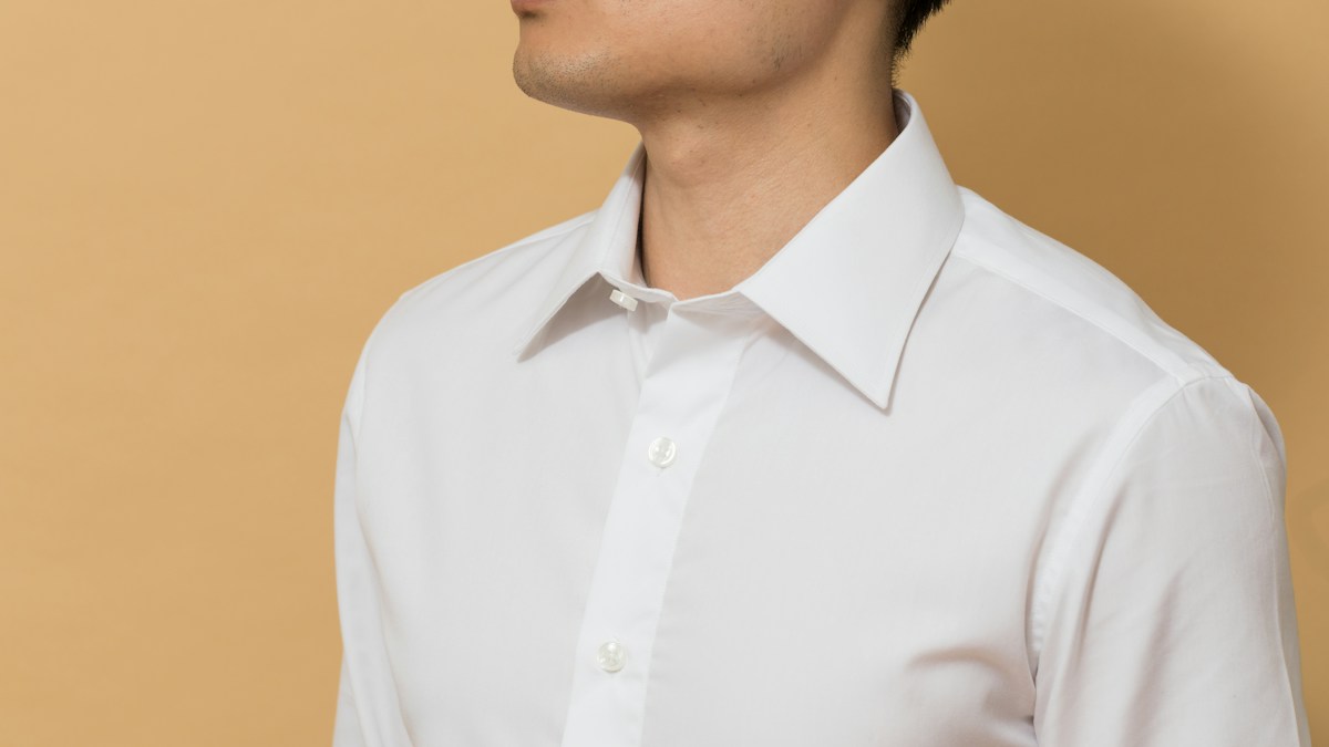 Man wearing white button-up shirt