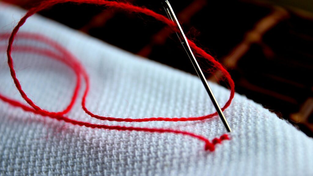 Needle in fabric