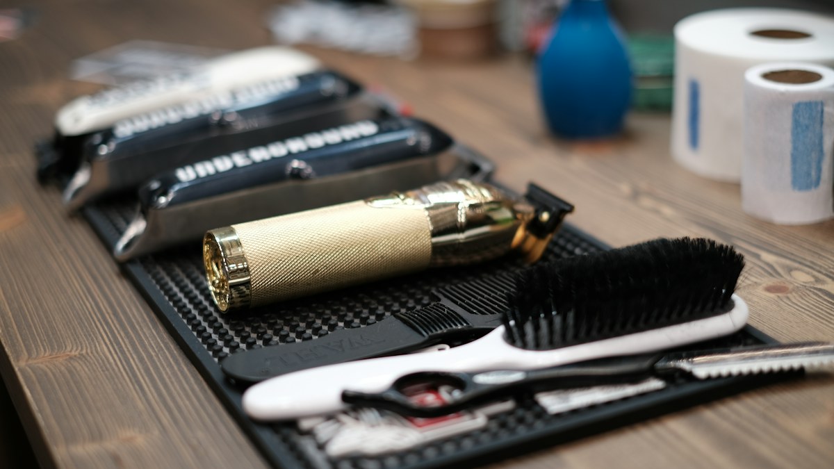Razor and grooming tools arranged on a tabletop