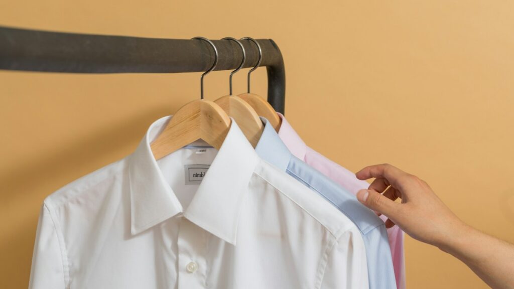 Light button-up shirt on hanger