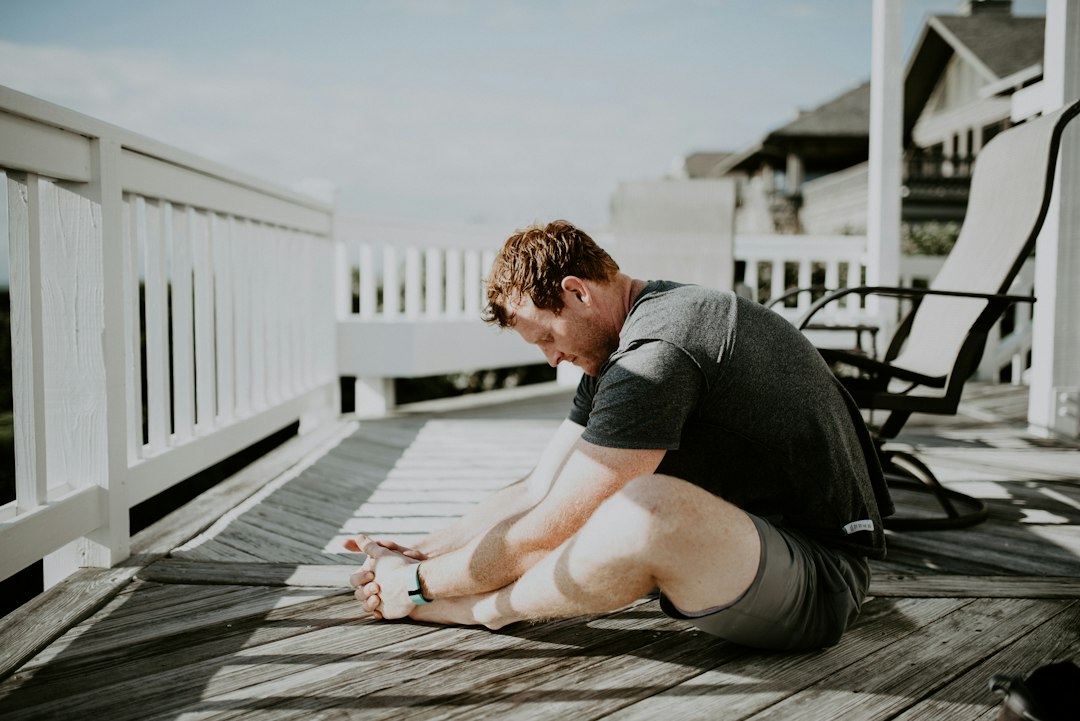 Man cooling down with a mobility stretch