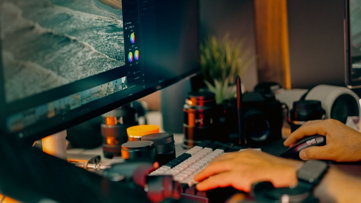 A digital photography-editing workstation with editing software and cameras