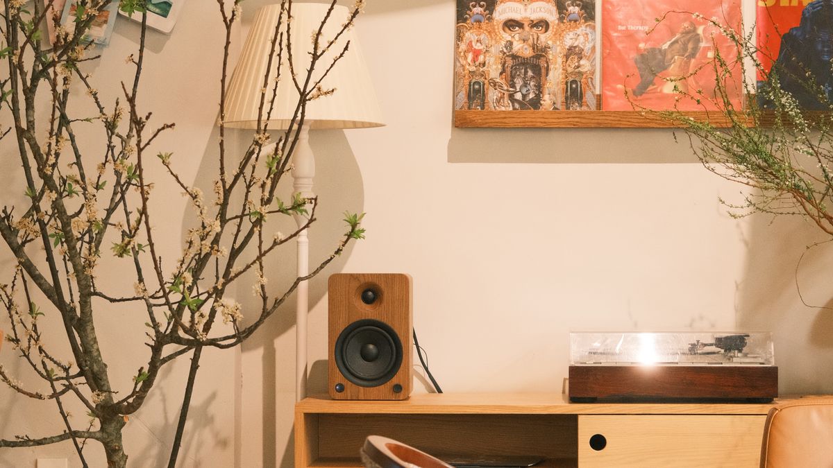 A vintage turntable and records in a relaxed listening room