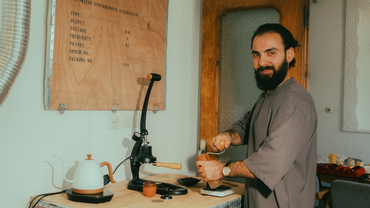 Man using a manual press